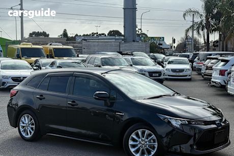 Black 2019 Toyota Corolla SUV TOURING HYBRID S