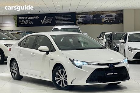 White 2021 Toyota Corolla Sedan ASCENT SPORT HYBRID F