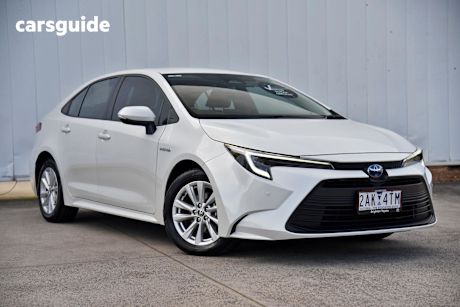 White 2024 Toyota Corolla Sedan ASCENT SPORT HYBRID F