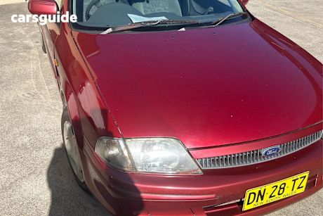 Red 2001 Ford Laser Sedan Lxi