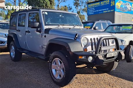 Silver 2013 Jeep Wrangler Sedan UNLIMITED SPORT 4X4
