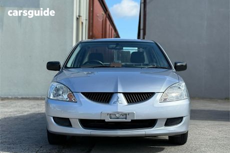 Silver 2004 Mitsubishi Lancer Sedan Es