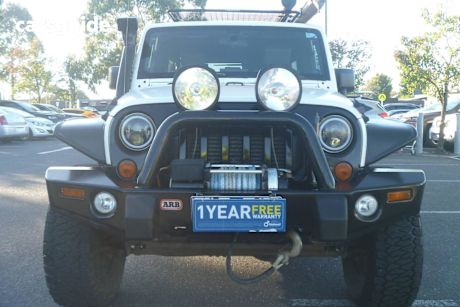 White 2010 Jeep Wrangler Softtop Unlimited Sport (4X4)