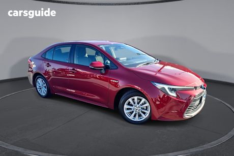 Red 2023 Toyota Corolla Sedan ASCENT SPORT HYBRID F