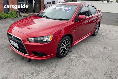 Red 2015 Mitsubishi Lancer Sedan ES SPORT F