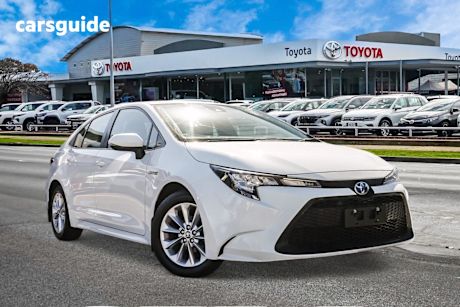 White 2022 Toyota Corolla Sedan ASCENT SPORT HYBRID F