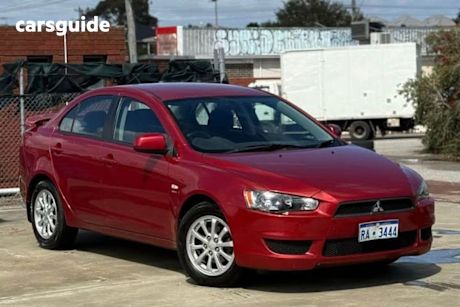 Red 2010 Mitsubishi Lancer Sedan VR F