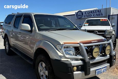 Gold 2010 Nissan Navara Dual Cab Pick-up St (4X4)