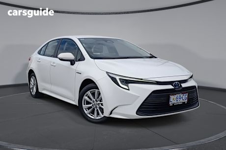 White 2023 Toyota Corolla Sedan ASCENT SPORT HYBRID F