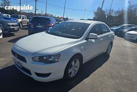 White 2012 Mitsubishi Lancer Sedan ES F