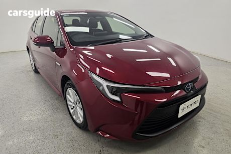 Red 2023 Toyota Corolla Sedan ASCENT SPORT HYBRID F