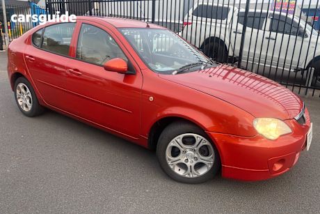 Orange 2006 Proton GEN.2 Hatch M-LINE CM