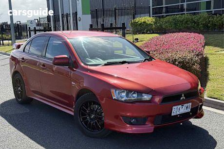Red 2007 Mitsubishi Lancer Sedan VR-X F
