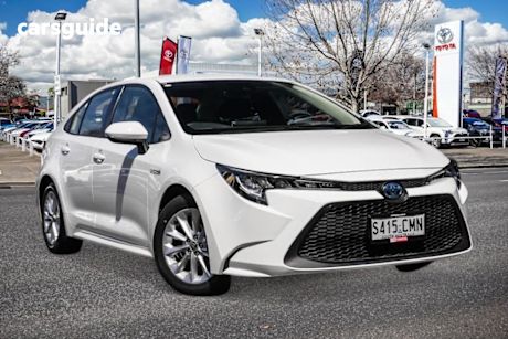 White 2021 Toyota Corolla Sedan ASCENT SPORT HYBRID F