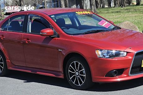 Red 2015 Mitsubishi Lancer Sedan Es Sport