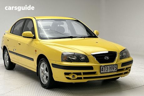 Yellow 2003 Hyundai Elantra Sedan Elite 2.0 Hvt