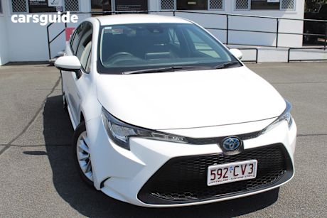 White 2021 Toyota Corolla Sedan ASCENT SPORT HYBRID F