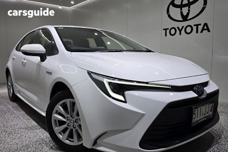 White 2024 Toyota Corolla Sedan ASCENT SPORT HYBRID F