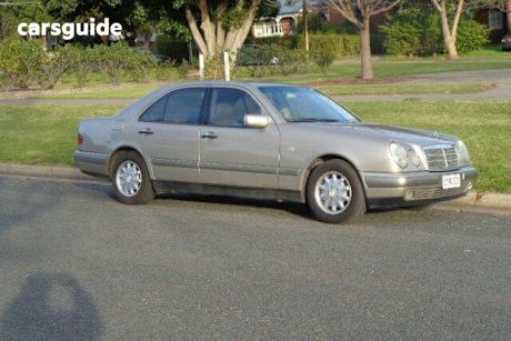 Yellow 1999 Mercedes-Benz E240 Sedan Elegance