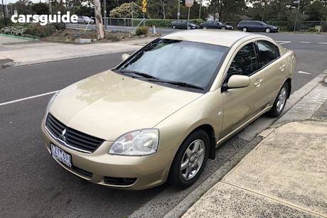Gold 2005 Mitsubishi 380 Sedan F