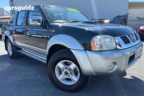 Black 2009 Nissan Navara Dual Cab Pick-up St-R (4X4)