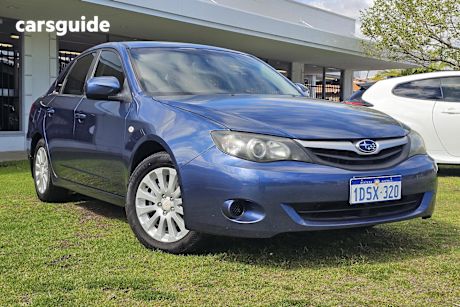 Blue 2011 Subaru Impreza Sedan R 4WD