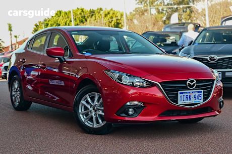 Red 2015 Mazda Mazda3 Sedan MAXX F