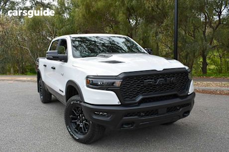White 2025 Ram 1500 Crew Cab Utility Rebel Hurricane