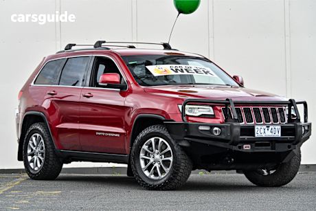 Red 2014 Jeep Grand Cherokee SUV LAREDO 4X4