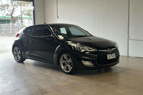 Black 2014 Hyundai Veloster Coupe +