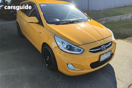 Yellow 2016 Hyundai Accent Hatch SR F
