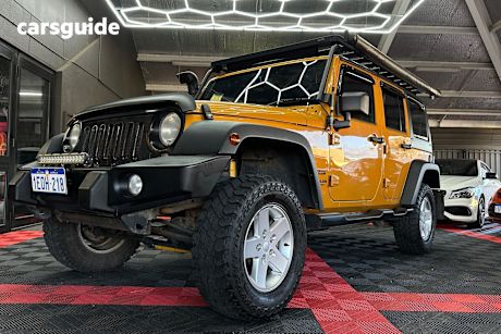Gold 2014 Jeep Wrangler Sedan UNLIMITED SPORT 4X4
