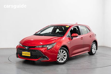 Red 2023 Toyota Corolla Hatchback Ascent Sport Hybrid