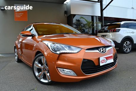 Orange 2013 Hyundai Veloster Coupe +
