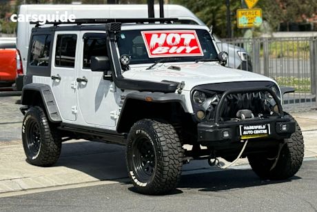 White 2014 Jeep Wrangler Sedan UNLIMITED SPORT 4X4