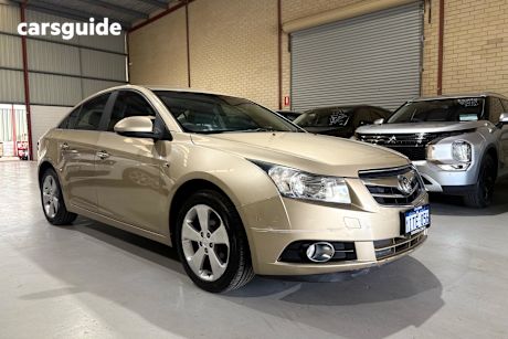 Gold 2009 Holden Cruze Sedan CDX JG