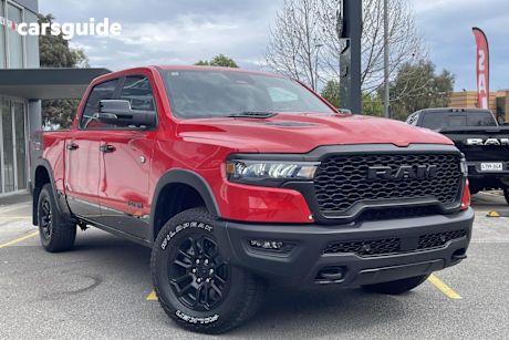 Red 2025 Ram 1500 Crew Cab Utility Rebel Hurricane