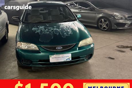 Green 1998 Ford Laser Sedan Glxi