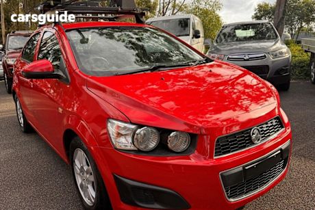 Red 2015 Holden Barina Sedan Cd