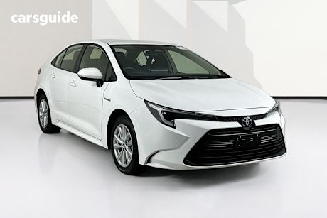 White 2023 Toyota Corolla Sedan Ascent Sport Hybrid