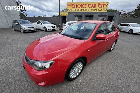 Red 2009 Subaru Impreza Sedan R (Awd)