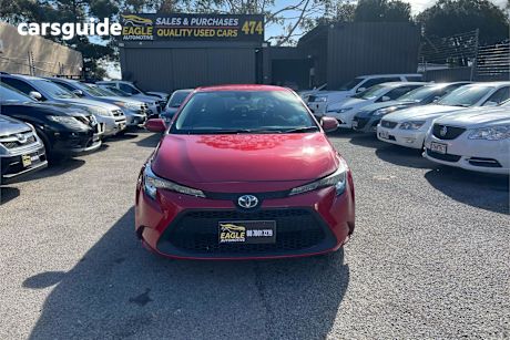 Red 2021 Toyota Corolla Sedan Ascent Sport (Hybrid)