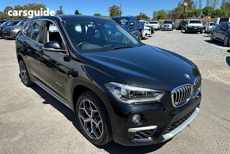 Black 2017 BMW X1 SUV SDRIVE18D F