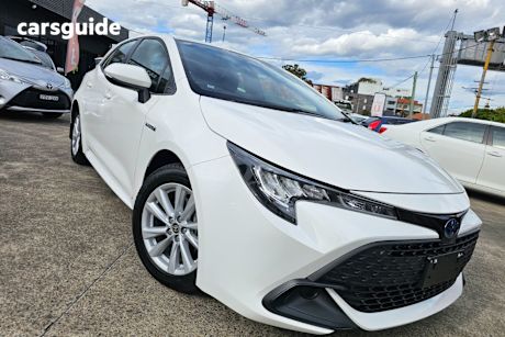 White 2023 Toyota Corolla Hatchback Ascent Sport Hybrid