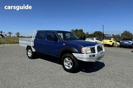 Blue 2004 Nissan Navara Dual Cab Pick-up Dx (4X4)