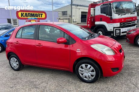 Red 2011 Toyota Yaris Hatchback Yr