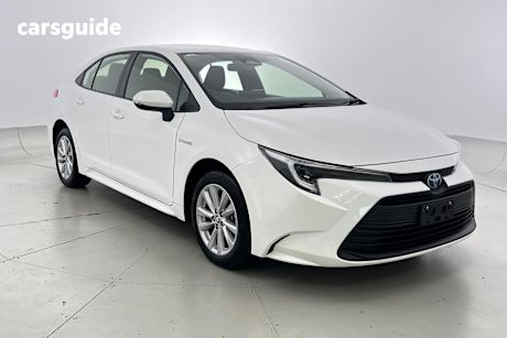 White 2024 Toyota Corolla Sedan ASCENT SPORT HYBRID F