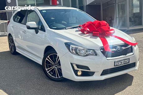 White 2016 Subaru Impreza Hatchback 2.0I (Awd)