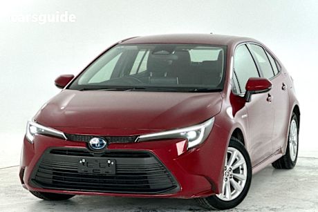 Red 2023 Toyota Corolla Sedan ASCENT SPORT HYBRID F