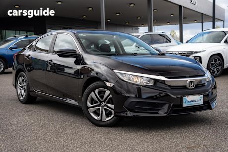 Red 2017 Honda Civic Sedan VTI F